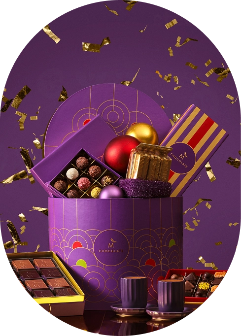 Luxurious chocolate gift box with falling confetti