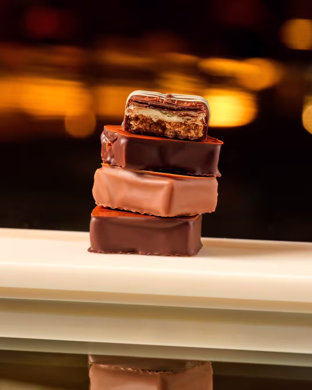 Stacked handcrafted chocolates